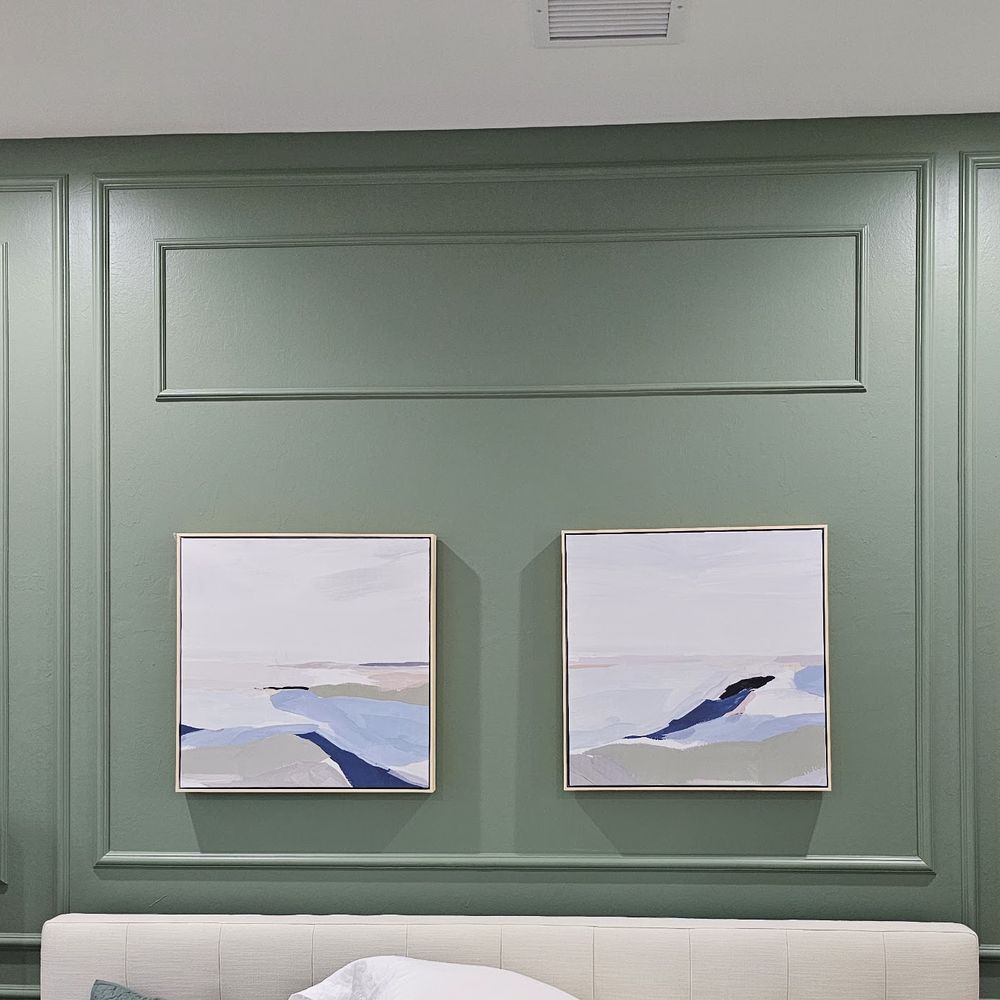 Green panel molding accent wall by Renovari