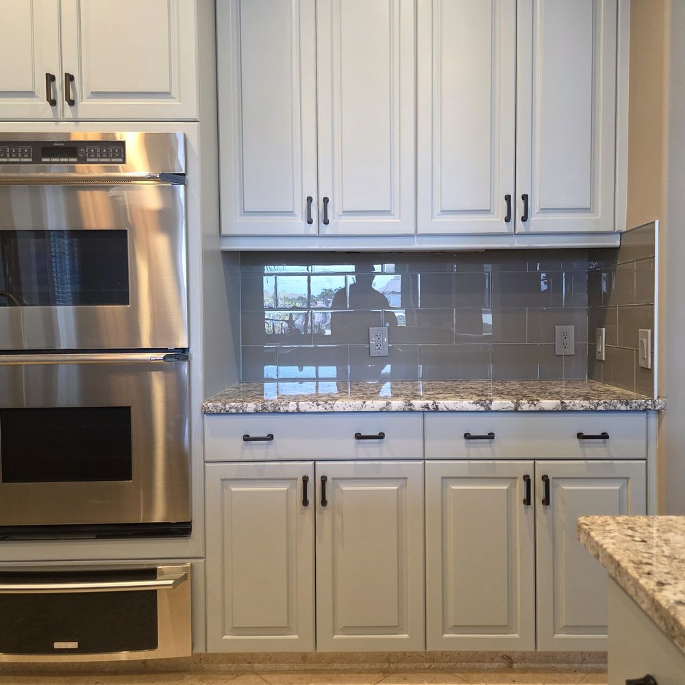 Kitchen cabinets painted by Renovari