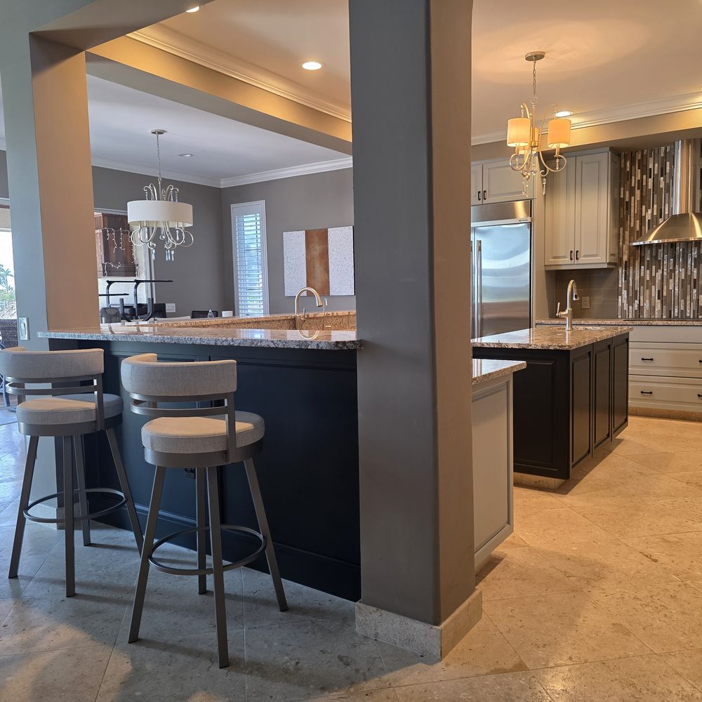 Two-tone kitchen cabinets painted by Renovari