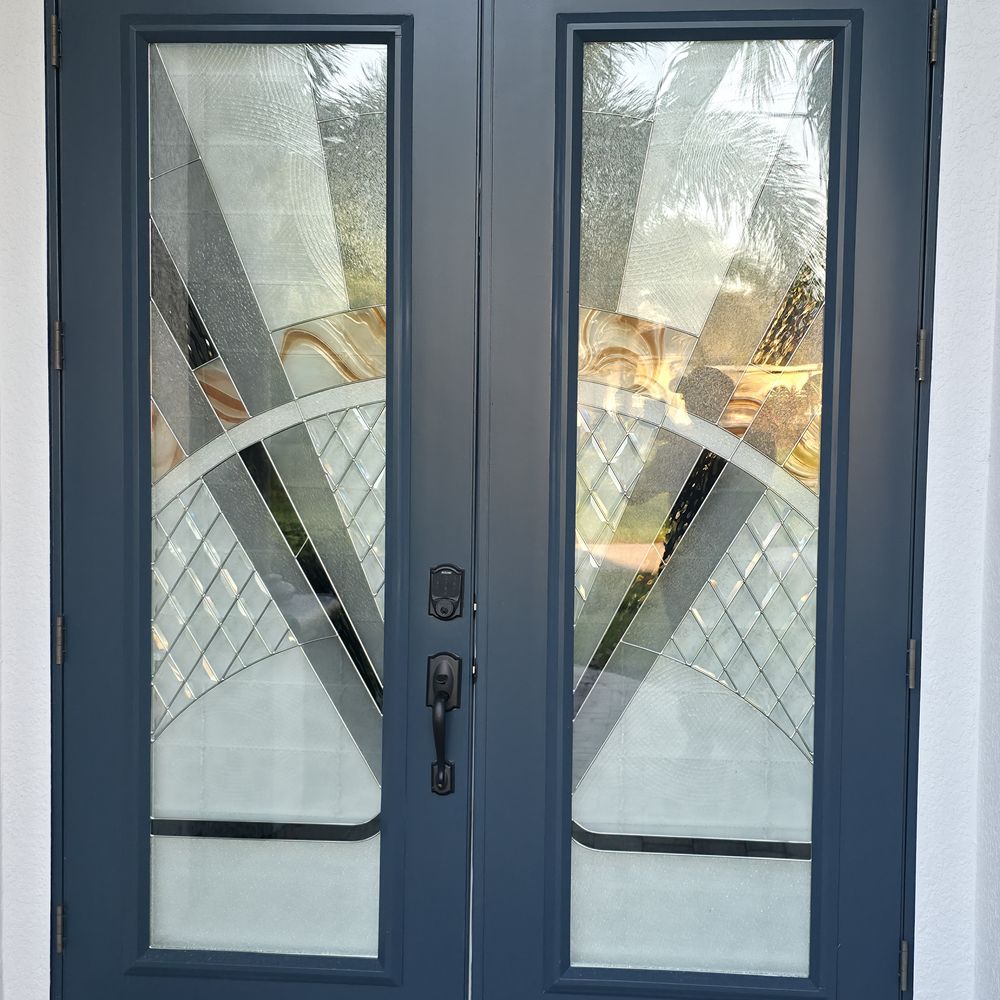 Double front door refinished in blue by Renovari
