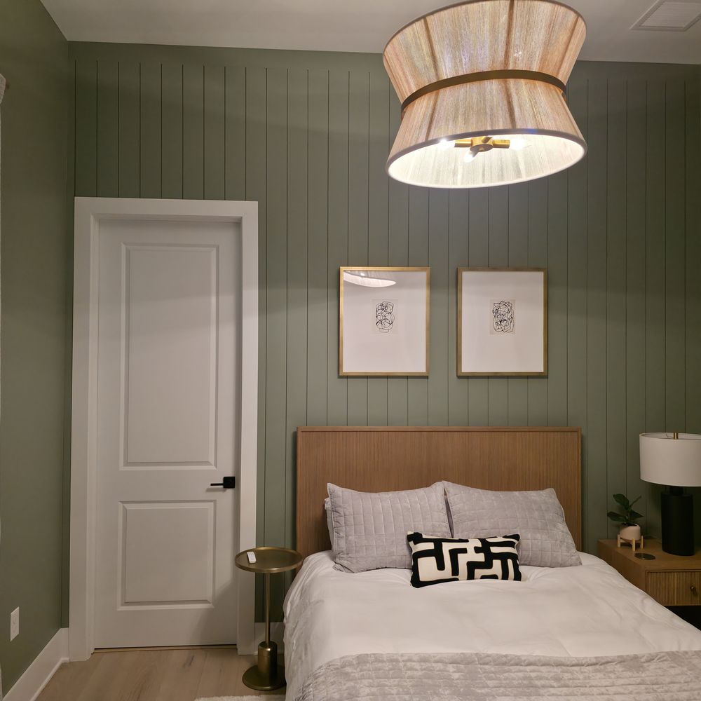 Bedroom interior painting with panel accent wall by Renovari