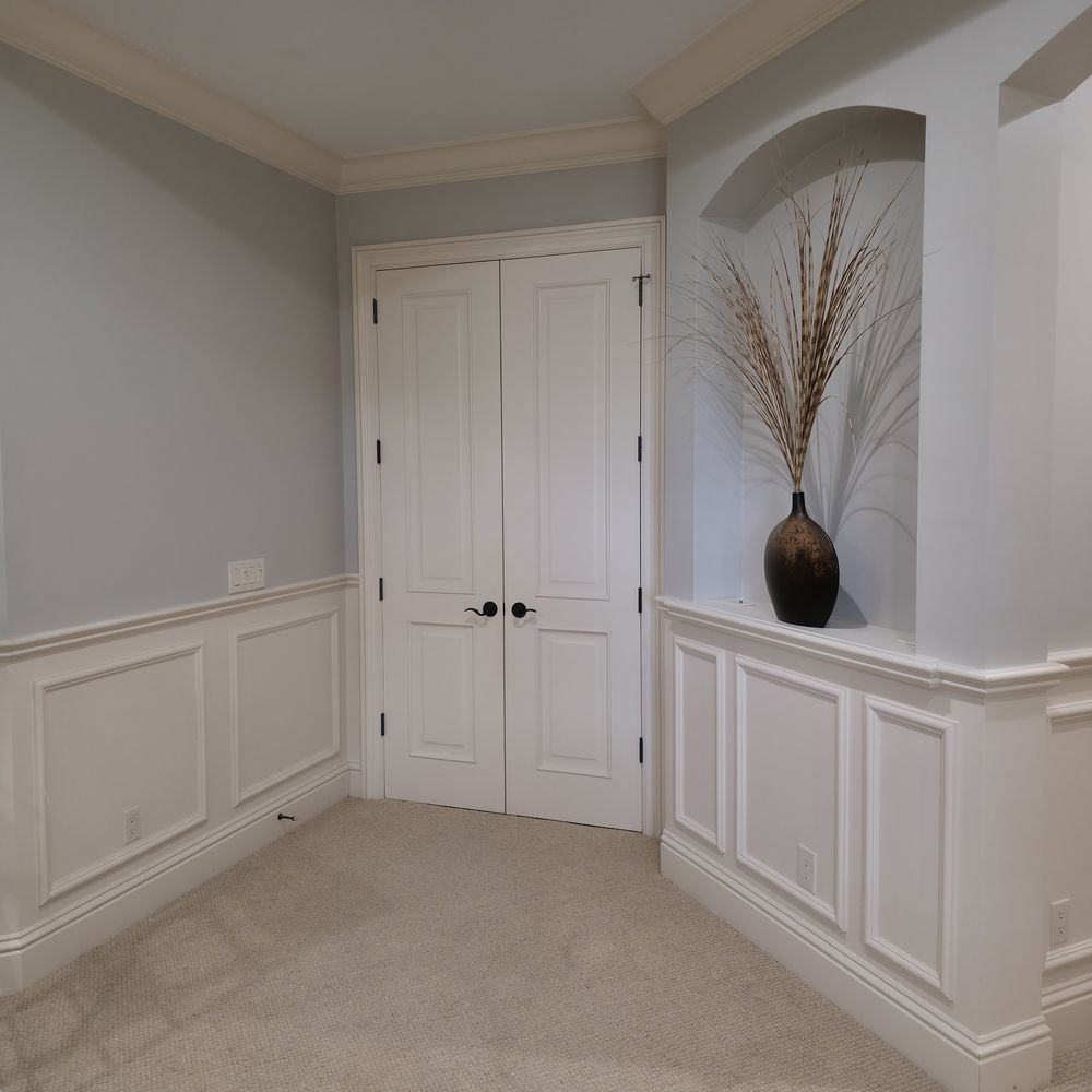 Wainscoting, niches and trim painted by Renovari